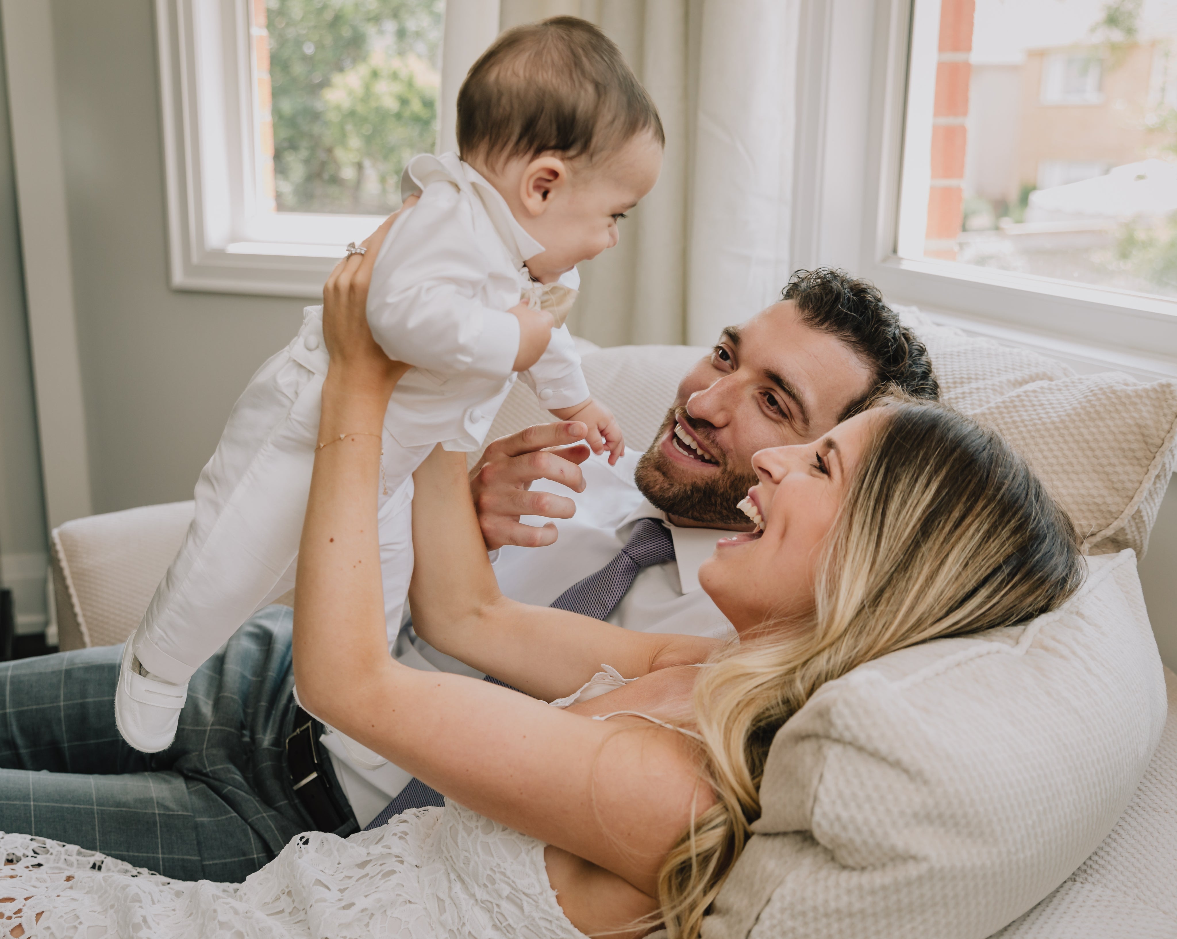 files/people-smile-at-a-small-baby-the-woman-is-holding-up.jpg